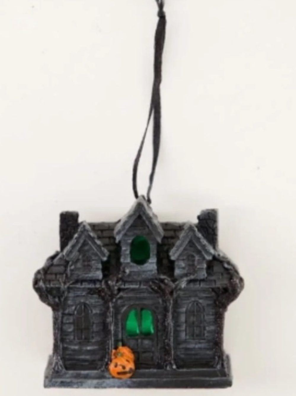 Spooky Black Haunted House Hanging Ornament with Green Window Glow